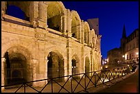 Arenes and church at night. Arles, Provence, France