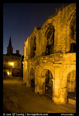 Roman arenes and church at night. Arles, Provence, France (color)