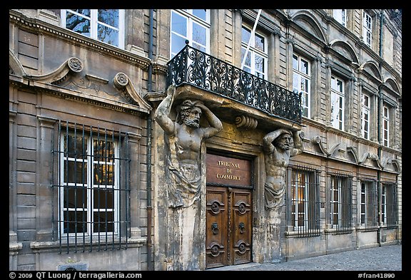 Facade with sculptures supporting a balcony. Aix-en-Provence, France (color)