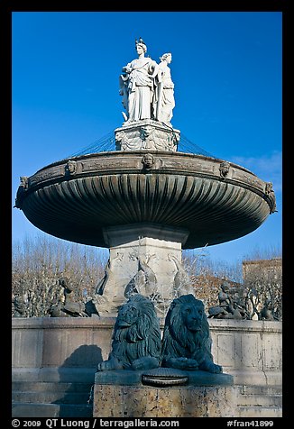 Monumental fountain with three statues representing art, justice and agriculture. Aix-en-Provence, France