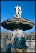 Monumental fountain with three statues representing art, justice and agriculture. Aix-en-Provence, France