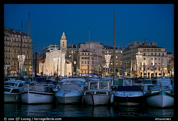 Yachts, church, and city at night, Vieux Port. Marseille, France