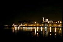 Avignon skyline at night with lights reflected in Rhone River. Avignon, Provence, France (color)