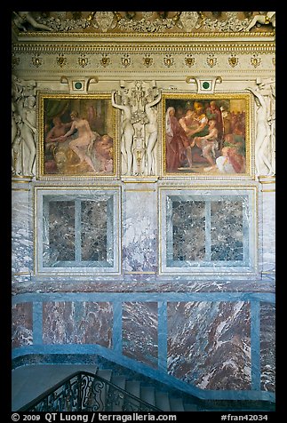 Wall decor in staircase inside Chateau de Fontainebleau. France