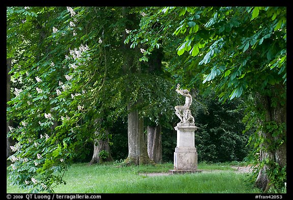 Sculpture, Horse chestnut trees (Aesculus hippocastanum), Chateau de Fontainebleau. France