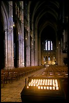 Candles, nave, and apse, Cathedral of Our Lady of Chartres,. France