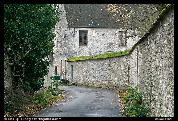 Street and stone wall, Provins. France