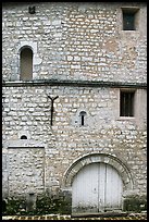 Facade detail of medieval house with small windows, Provins. France ( color)