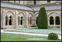 Cloister courtyard with dusting of snow Abbaye de Fontenay. Burgundy, France (color)