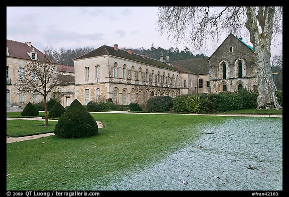 Lawn and forge in winter, Abbaye de Fontenay. Burgundy, France (color)