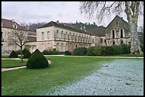 Lawn and forge in winter, Abbaye de Fontenay. Burgundy, France (color)