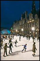 Holiday ice ring, City Hall by night. Paris, France (color)