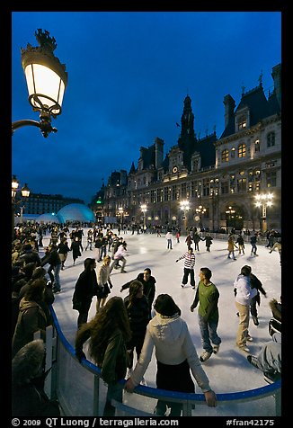 Holiday skating rink at night, City Hall. Paris, France