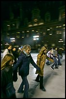 Girls skating by night, Hotel de Ville. Paris, France (color)