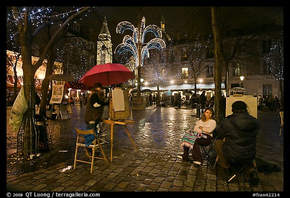 Place du Tertre by night with Christmas lights, Montmartre. Paris, France