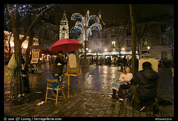 Place du Tertre by night with Christmas lights, Montmartre. Paris, France