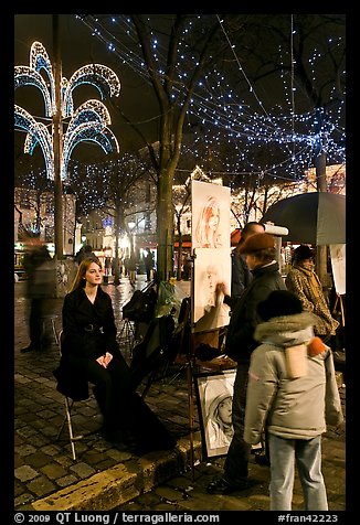 Portraitist at work, Place du Tertre, Montmartre. Paris, France (color)