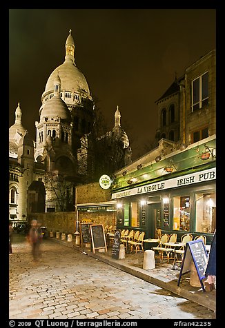 Sacre-Coeur basilica and restaurant by night, Montmartre. Paris, France