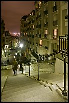 Woman on stairs by night, Montmartre. Paris, France ( color)