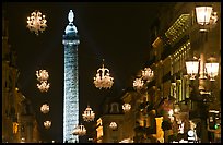 Christmas lights and Place Vendome column by night. Paris, France (color)