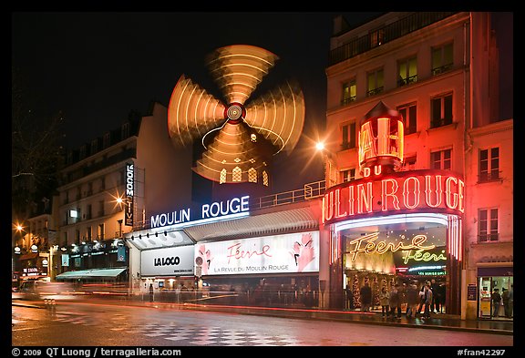 Windmill marking the Moulin Rouge Cabaret. Paris, France (color)