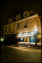 Houses with restaurant at street level, Montmartre. Paris, France ( color)