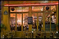 Popular cafe restaurant by night. Paris, France (color)