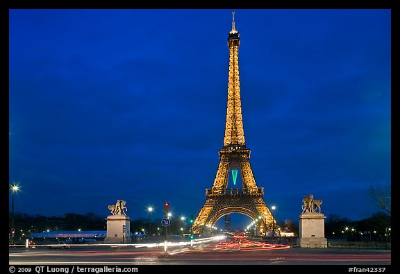 Eiffel Tower seen across Iena Bridge at night. Paris, France (color)