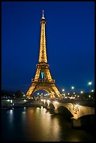 Seine River, Iena Bridge, and illuminated Eiffel Tower. Paris, France