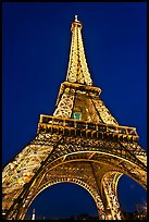 Illuminated  Eiffel Tower seen from close. Paris, France