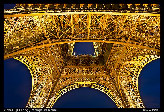 Eiffel Tower structure by night. Paris, France