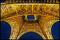 Eiffel Tower structure by night. Paris, France