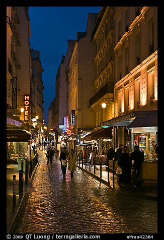 Pedestrian street with restaurants at night. Quartier Latin, Paris, France (color)