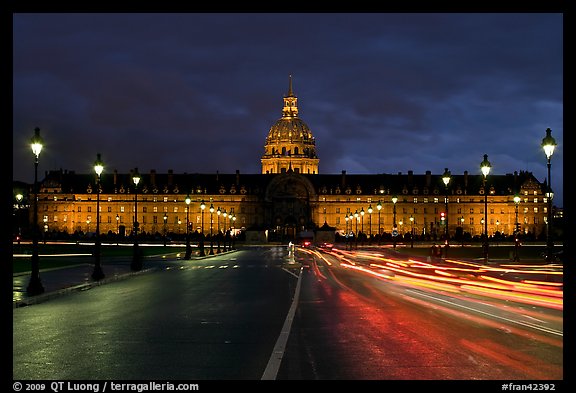 The Invalides: Mansart's dome above Bruant's pedimented central block by night. Paris, France