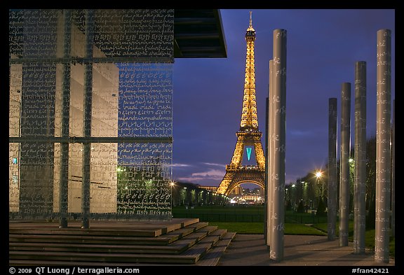 Peace monument and Eiffel Tower by night. Paris, France (color)