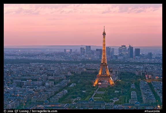 Eiffel Tower, Champs de Mars, La Defense at sunset. Paris, France (color)