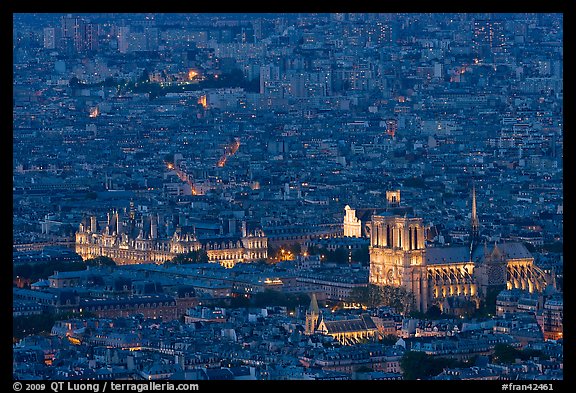 Aerial night view with Notre-Dame and Hotel de Ville. Paris, France