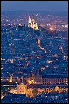 Aerial view with Louvre and Montmartre at night, Montmartre. Paris, France