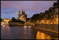 Banks of the Seine River, Ile de la Cite, Ile Saint Louis, and Notre Dame at twilight. Paris, France (color)