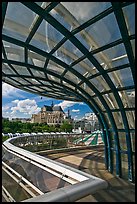 Curvy glass and metal structure framing historic Saint-Eustache church. Paris, France ( color)