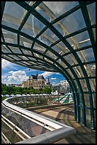 Curvy glass and metal structure framing historic Saint-Eustache church. Paris, France (color)