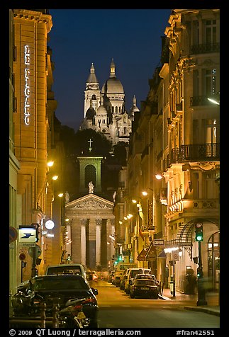 Street, Notre-Dame-de-Lorette, and Sacre Coeur at night. Paris, France (color)