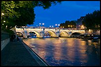 Quay, Seine River, and Pont-Neuf at night. Paris, France ( color)
