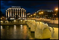 Pont Neuf and Samaritaine illuminated at night. Paris, France (color)