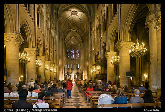 Interior of Notre-Dame de Paris during mass. Paris, France