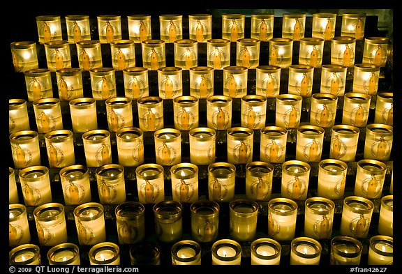 Array of candles, Notre-Dame cathedral. Paris, France