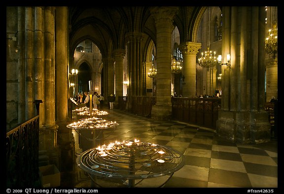 North Aisle and candles, cathedral Notre-Dame-de-Paris. Paris, France (color)