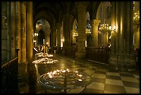 North Aisle and candles, cathedral Notre-Dame-de-Paris. Paris, France