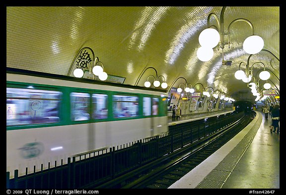 Subway train and station. Paris, France (color)