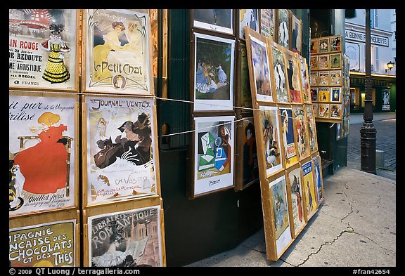 Reproduction of period posters for sale, Montmartre. Paris, France (color)